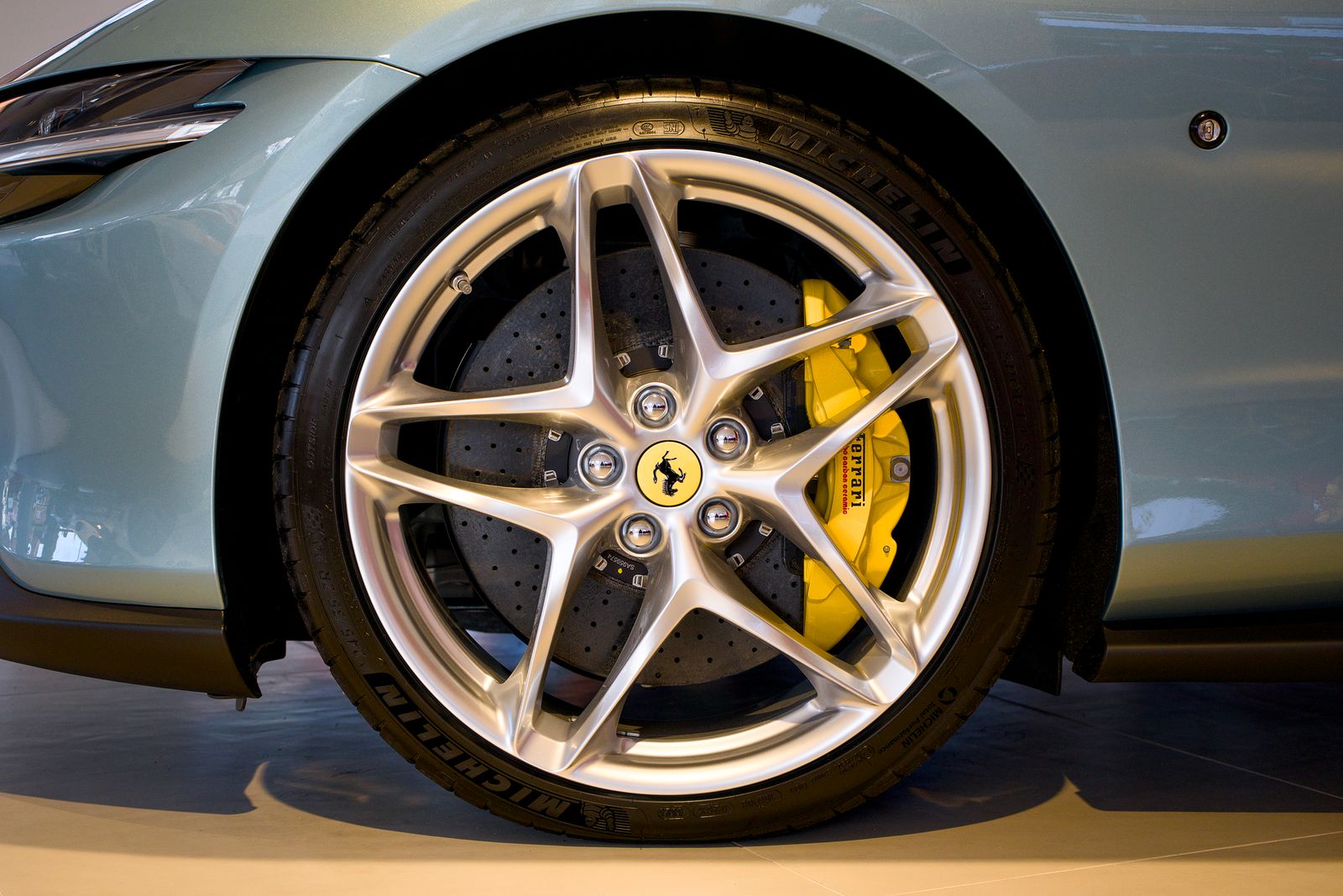 Brake disc and caliper on a lifted car